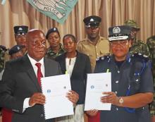 Magwaya and Mbewe pose after signing the MOU